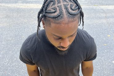 Loc Retwist Styled with Petal Buns